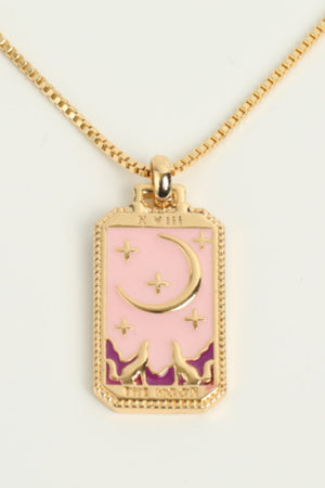 Celestial tarot pendant necklace with moon and stars on pink enamel, gold chain