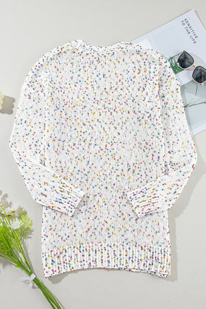 Confetti knit open-front cardigan in ivory with colorful speckles.
