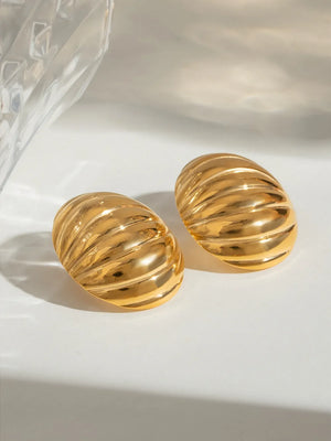 Gold dome earrings with ribbed texture, 18K gold-plated.