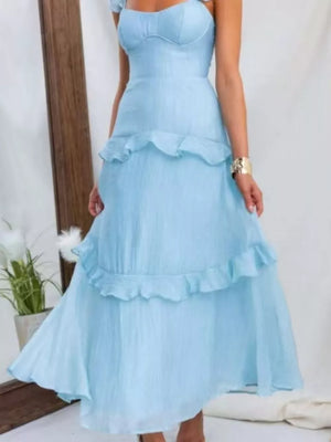 Aqua ruffled maxi dress with sweetheart neckline and tiered skirt.