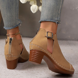 Khaki criss-cross cut-out block heel sandals with ankle strap and back zipper.