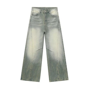Men's wide leg jeans in a light wash denim with a gradient effect and distressed details.
