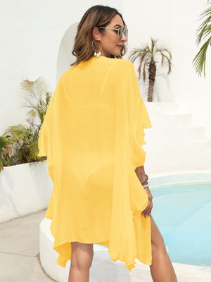 Yellow beach kimono with cascading ruffles, 100% polyester, open front, sheer fabric.