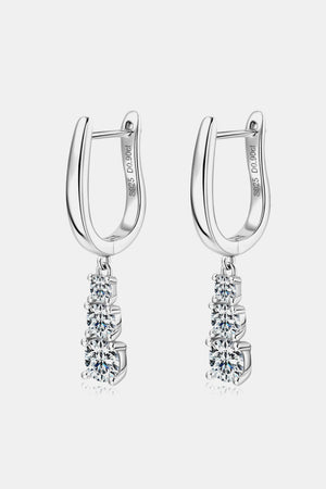 Silver cascading moissanite hoop earrings with three graduated stones.