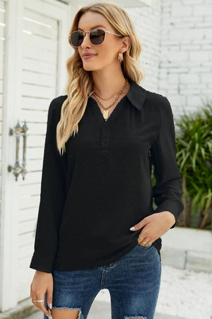 Black textured collared blouse with button detail and long sleeves.