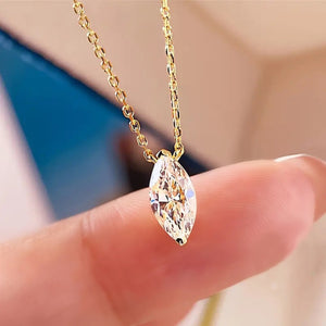 Gold chain necklace with marquise cut zircon pendant