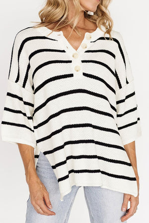 White and black striped knit pullover sweater with button-down neckline and short sleeves.