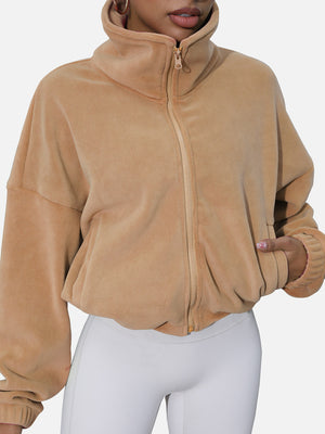 Tan fleece cropped funnel neck jacket with zip closure and pockets