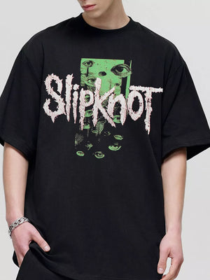 Black cotton crew neck tee with vintage Slipknot graphic and distressed eyes design.