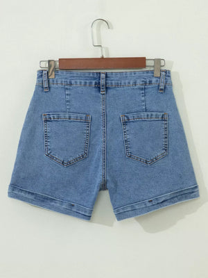 Blue cuffed denim shorts with button closure and two back pockets.