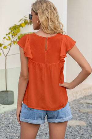 Orange ruffle sleeve blouse with embroidered yoke and keyhole back.