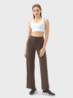 Mocha wide-leg drawstring active trousers with pockets and a relaxed fit.