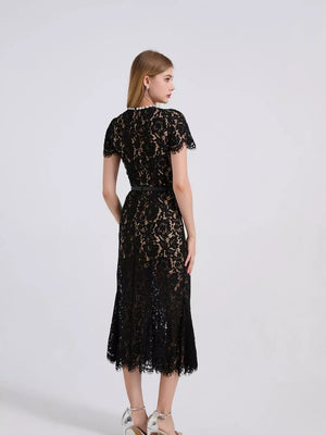 Black floral lace mermaid dress with short sleeves and a belt.