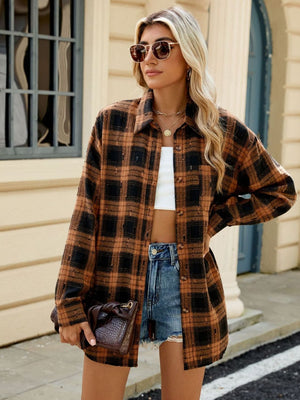 Ochre distressed plaid overshirt with relaxed fit, buttoned front, and frayed details.