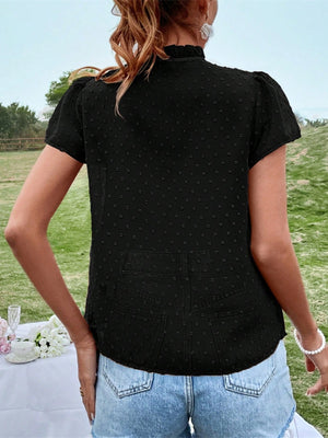 Black dotty frill tie neck blouse with short puff sleeves.
