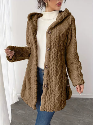 Camel textured hooded coat with button detail and cable knit pattern.