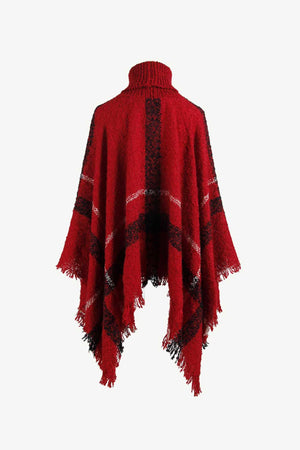 Deep Red plaid turtleneck cape with fringe detail and textured acrylic knit.