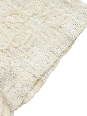 Delicate floral lace tie-front shirt in ivory with open knit and cutout details.