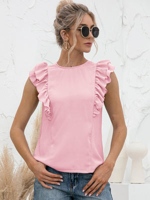 Blush pink sleeveless blouse with ruffled yoke and sleeves.