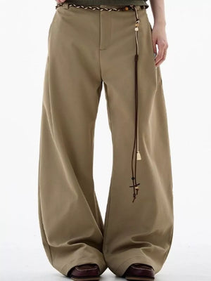 Men's relaxed fit wide-leg sweatpants in khaki with a decorative tassel belt.