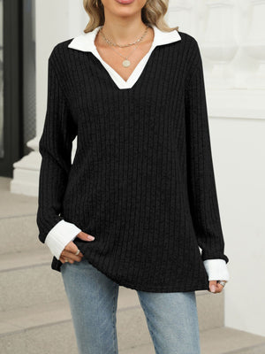 Black ribbed knit long sleeve t-shirt with white collar and cuffs.