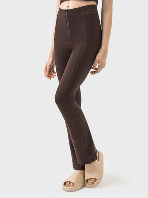Sculpted flare active trousers in chocolate brown with a zip front and seam detail.
