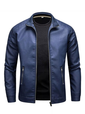 Blue zip-up track jacket with quilted shoulders and zippered pockets