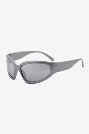 Mid Gray sculpted shield sunglasses with a sleek, modern design.