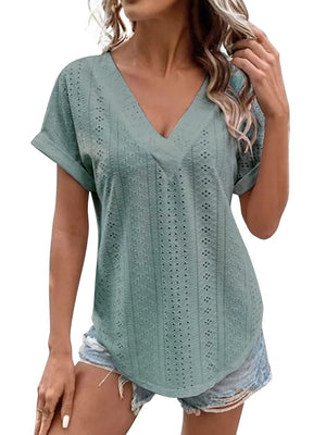 Sage eyelet v-neck tunic top with cuffed short sleeves and a relaxed fit.