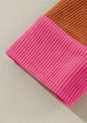 Colorblock corduroy shacket in hot pink and brown patchwork, featuring a wide wale texture.