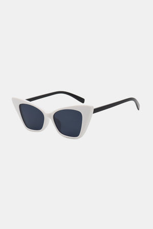 White cat-eye sunglasses with dark lenses and black arms