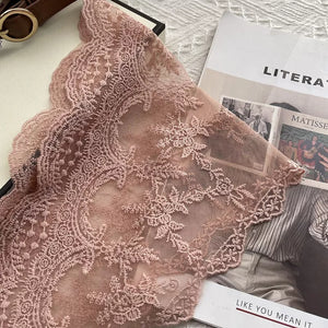 Delicate pink floral lace scarf with intricate embroidery and scalloped edge.