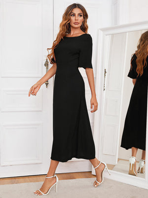 Black midi dress with short sleeves and a keyhole back detail.