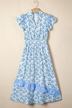Blue hydrangea print midi dress with flutter sleeves, smocked waist, and ruffled tiers.