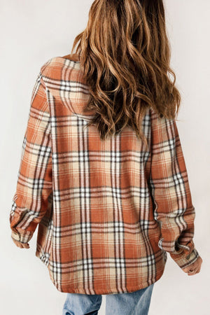 Sherpa-lined plaid overshirt jacket in tangerine with button front and casual fit.