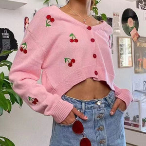 Pink cropped cardigan with cherry embroidery and button front