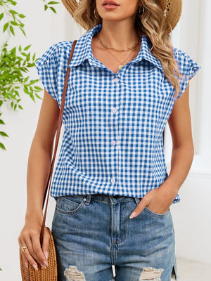 Blue gingham cotton shirt with cap sleeves and button-down front.