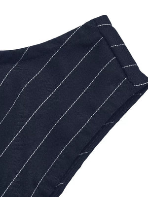 Navy striped tie-waist A-line dress detail showing fabric texture and white pinstripes.