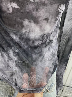 Gray black mesh t-shirt with butterfly print and asymmetrical cutout detail.
