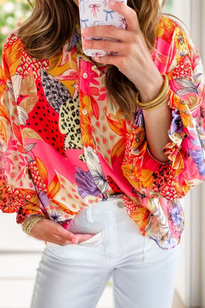 Patchwork floral blouson sleeve blouse in strawberry pink with blouson sleeves and button front.