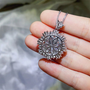 Radiant Cluster Pendant Necklace in white, featuring a floral-inspired design with sparkling stones.