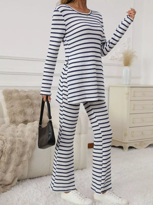 Blue striped knit two-piece set with flared pants and a long sleeve top.