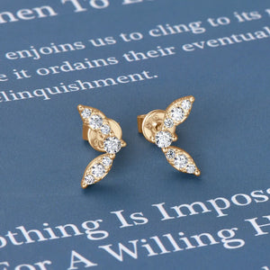 Gold moissanite leaf cluster stud earrings with sparkling cubic zirconia accents.