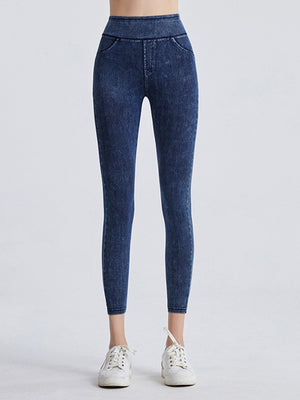 Denim illusion sculpt leggings in dark wash with faux pockets and a high waist.
