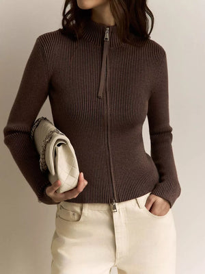 Chocolate ribbed zip-up cardigan with mock neck and long sleeves.