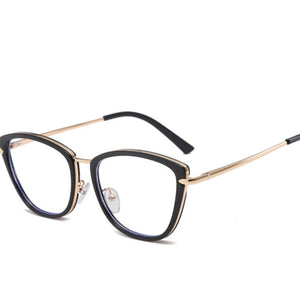 Black cat-eye glasses with gold metal accents and clear lenses