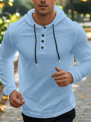Light blue Henley hooded linen blend shirt with button placket and drawstring.