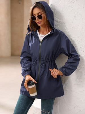 Navy hooded jacket with cinched waistline and full zip