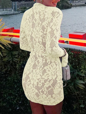 Light yellow lace cutout mini dress with flared sleeves and floral pattern.