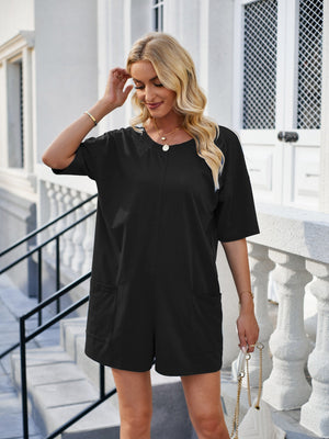 Black relaxed backless tee romper with pockets and short sleeves